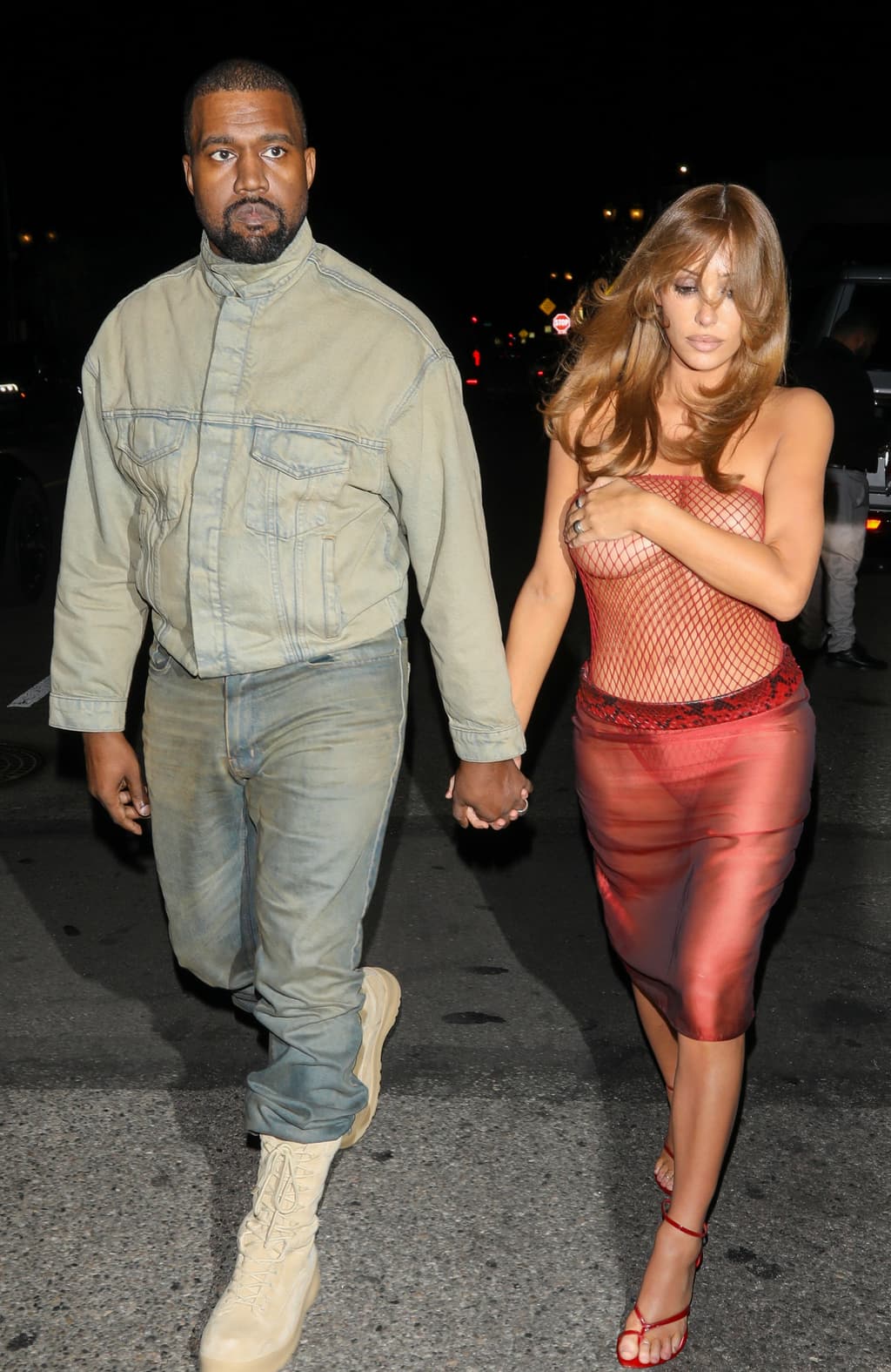 Bianca Censori leaves party topless after night out with husband Kanye West Bianca Censori leaves party topless after night out with husband Kanye West